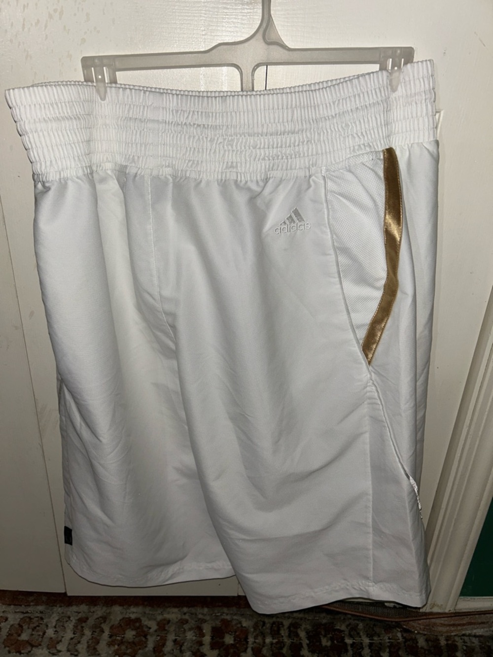 Vintage David Beckham adidas Men’s White Athletic Shorts with Gold Trim.